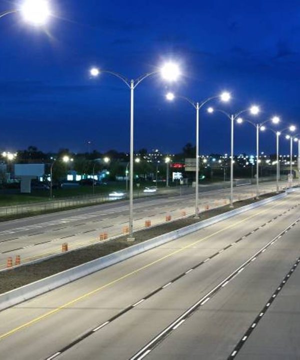 Modern LED street lights on a quiet road at night